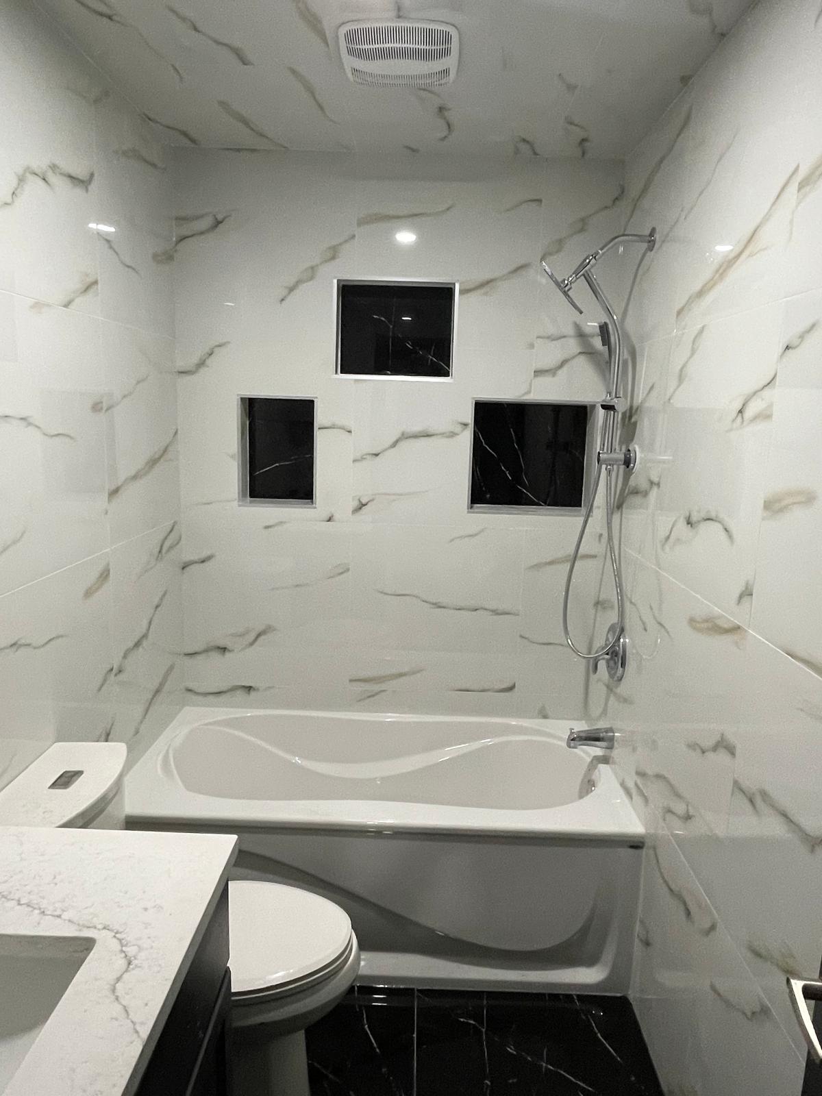 Marble bathroom remodel by ALZ Quality Renovations